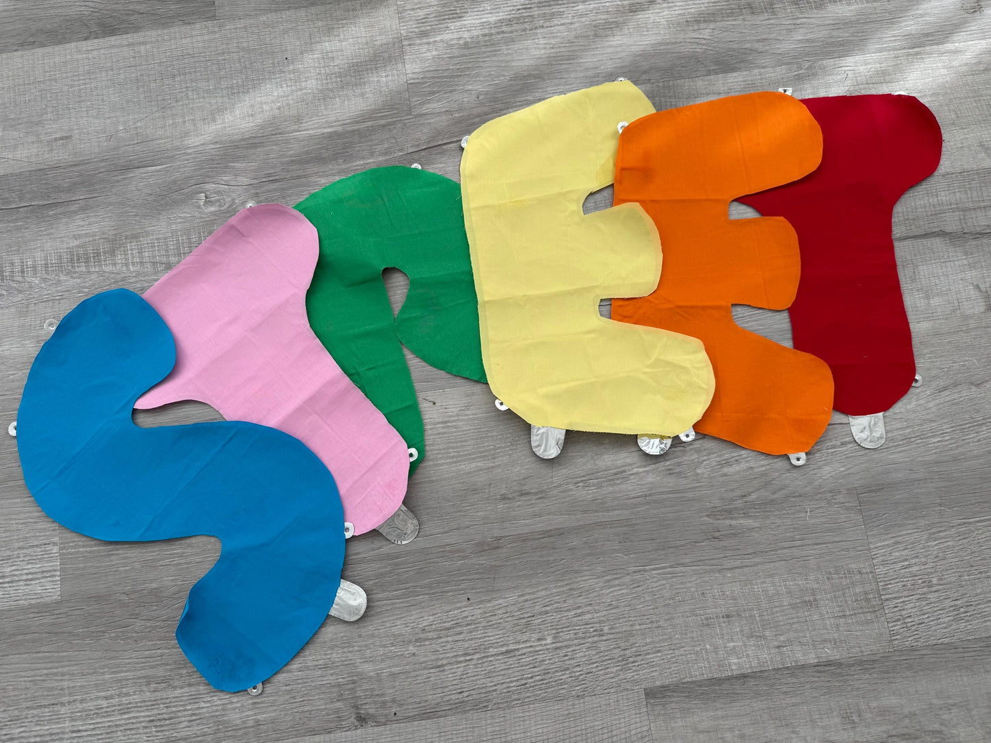 Custom balloon letter banner backdrop for personalized party and event decorations