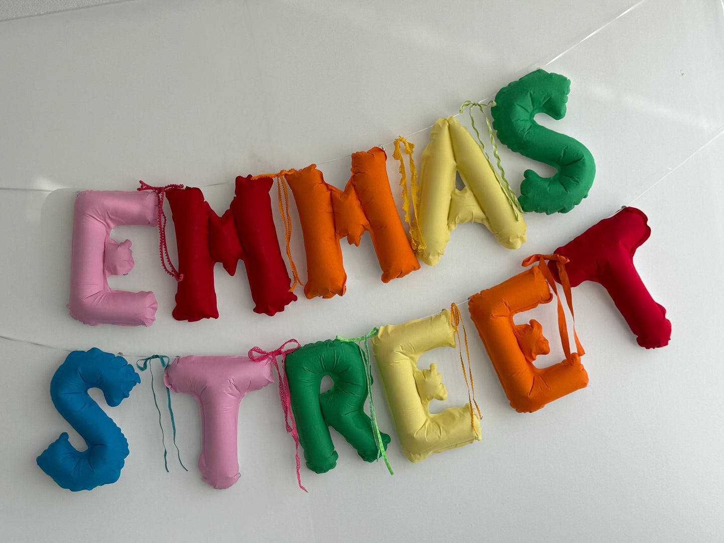 Custom balloon phrase name banner for personalized party backdrop decorations